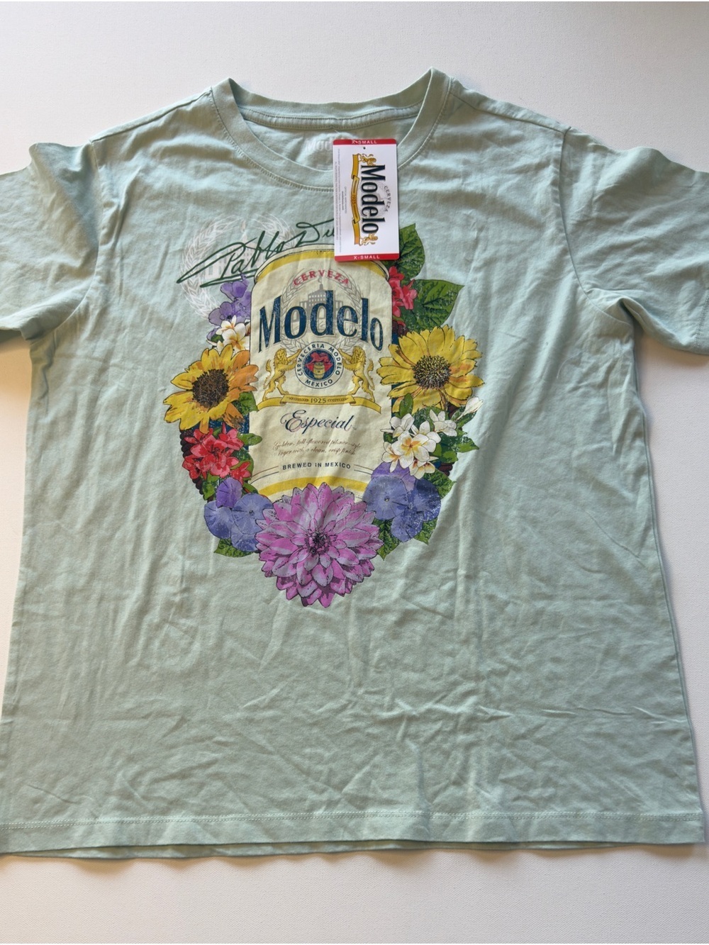 NWT Women's Modelo Floral Logo Tee in Light Mint XS (D2)